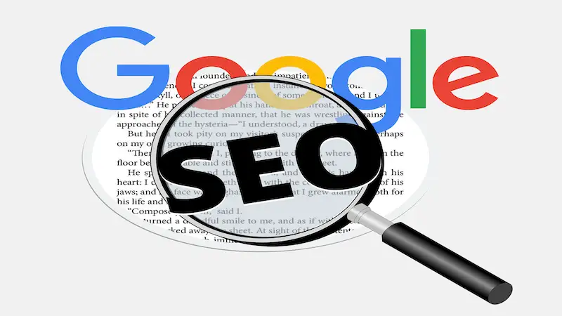 The image shows Google's logo above a text, and under it, it's written SEO with a magnifying glass above it.