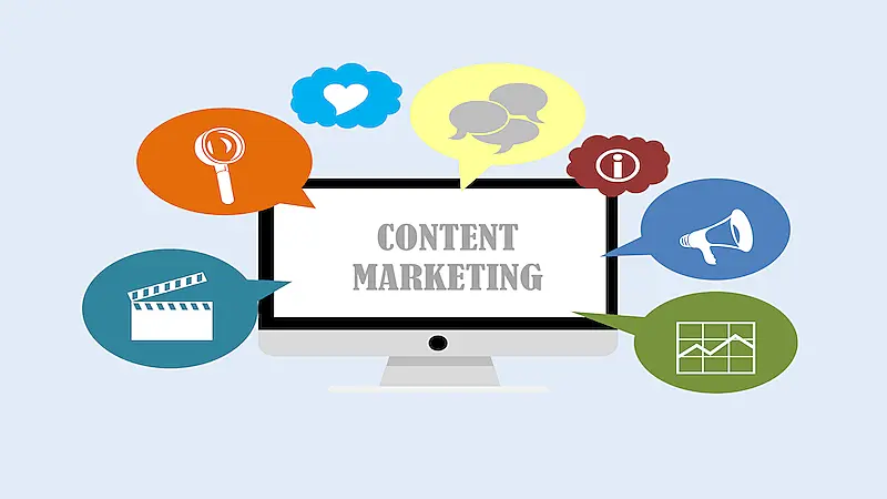 THe image shows a computer screen where it's written "Content Marketing", around it there are several speech baloons.