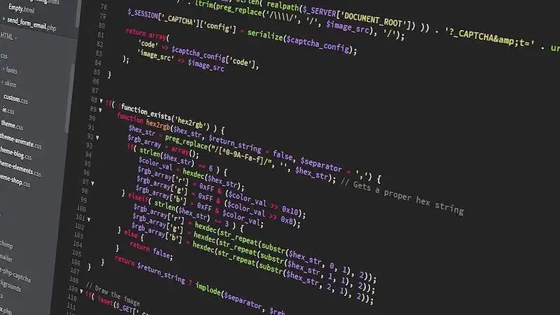 The image shows a computer screen with coding