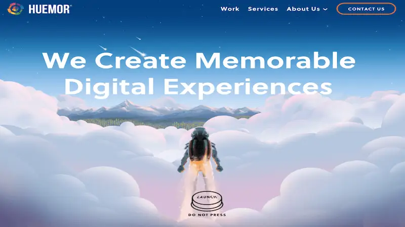 The image shows Huemor landing page where there is an astronaut among clouds. Above it's wrriten "We create memorable digital experiences", and under there is a buttonw where it's written "Launch", and below it's the warning "Do not press".
