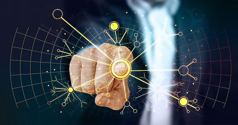 THe image shows someone touching a screen where it appears several connections.