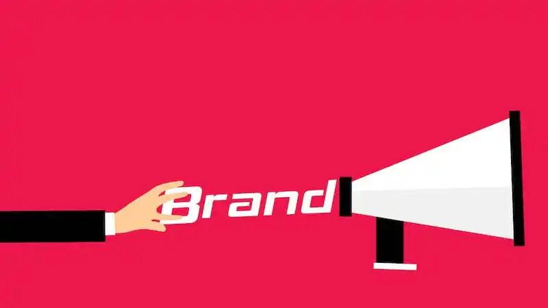 The image shows the word "Brand" being inserted into a speaker.