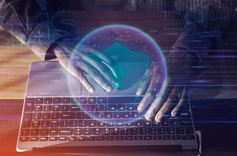 The image shows someone using the computer