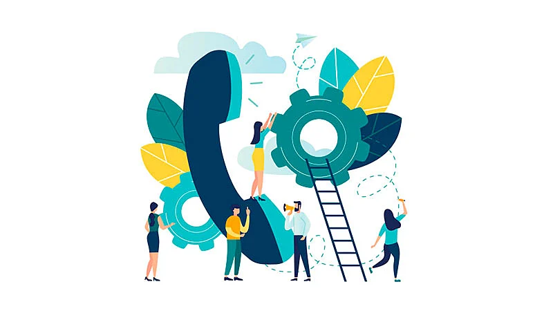 Personas atendiendo un teléfono gigante