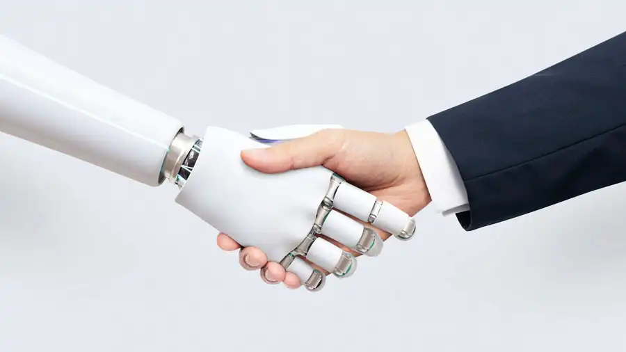 Automatización de marketing Imagen de un robot y un hombre dando las manos