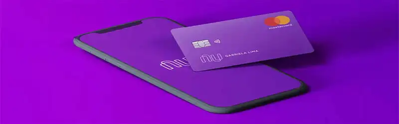 Banco digital Imagem de um celular e um cartão com a logo do Nubank