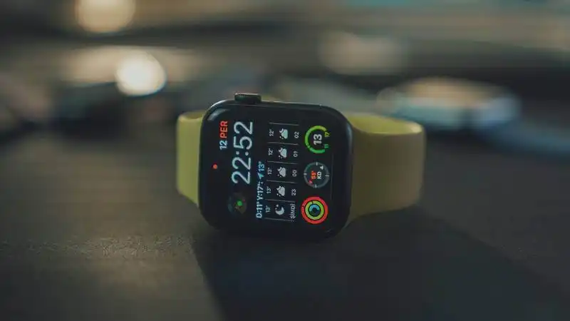 The image shows a smartphone on a table