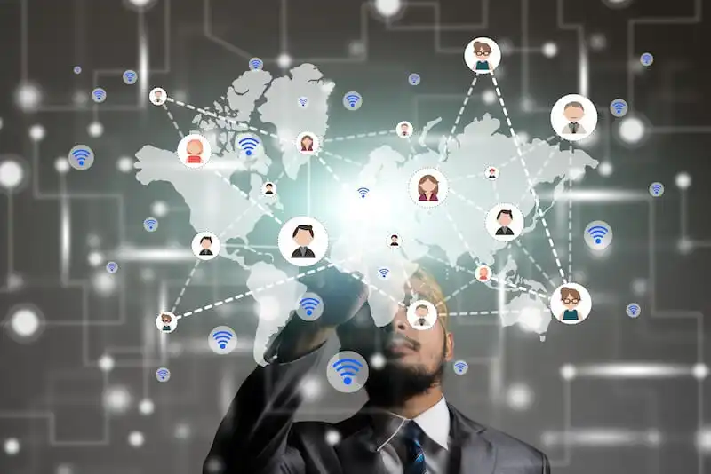 The image shows a world map with an illustration of people connected by lines in front of it.