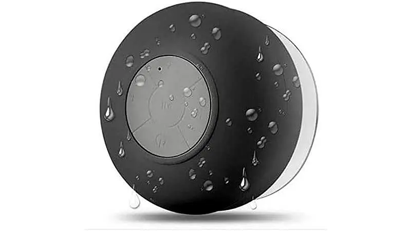 imagem de uma caixa de som bluetooth Mini Exbom na cor preta cinza