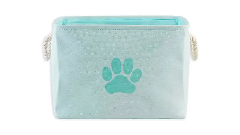 imagem de uma caixa organizadora de brinquedos de pet na cor azul e estampa de pata