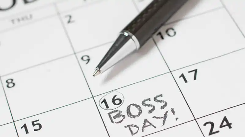 Calendário Comercial Foto de um calendário e uma caneta