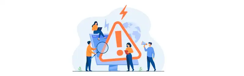 Colaboradores conferindo um computador com o ícone de erro