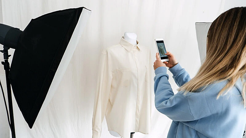 Foto de um estudio de fotografia e um maniquim