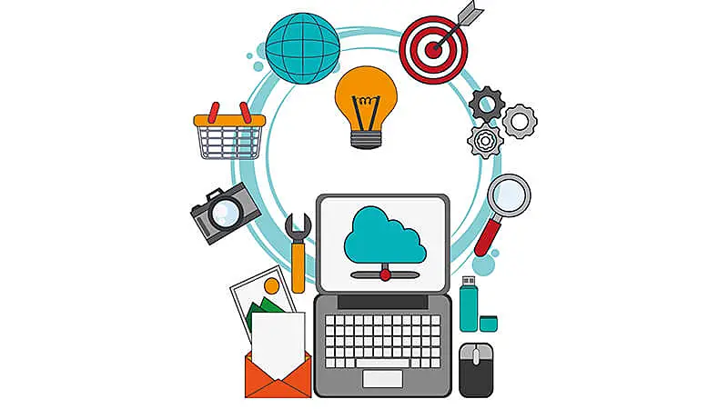 Computador acompanhado de símbolos de vendas