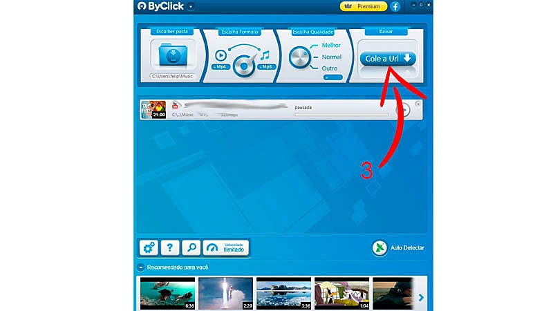 Interface do conversor mp3 ByClick Download com seta apontando para o botão "Cole a URL"
