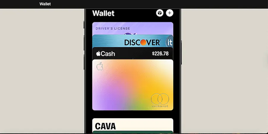 Apple Wallet interface on iPhone displaying stored cards, including Apple Cash, Discover card, driver’s license, and loyalty cards