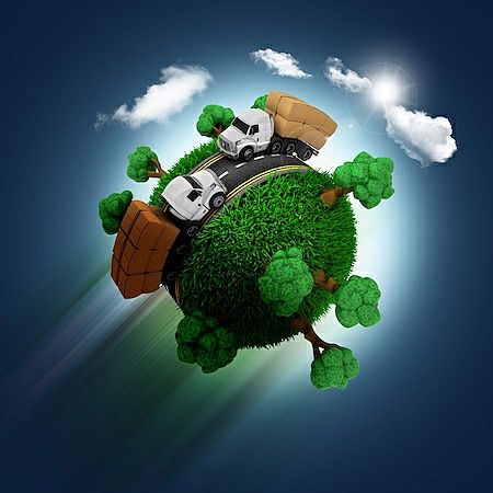 The image shows a miniature of the globe with grass, trees, and a road where trucks are passing.