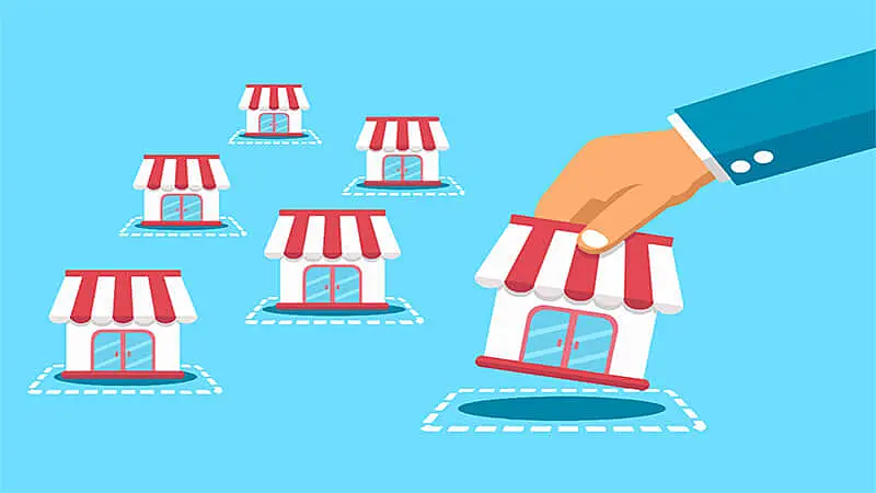 Imagem de uma mão segurando uma loja e colocando ao lado de outras