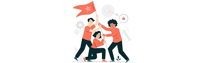 Equipo levantando una bandera juntos