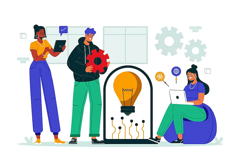 The imge shows 2 women and 1 men. One woman is holding a tablet, and the other one is holding one using a laptop. The man is holding an engine.