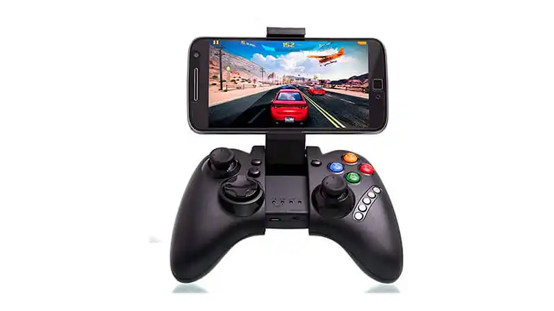 Gamepad Ípega imagem de um gampad Ipega PG-9021 na cor preta com um smartphone acoplado ao suporte