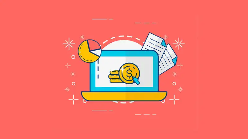 Tela de um notebook com moeas e gráficos