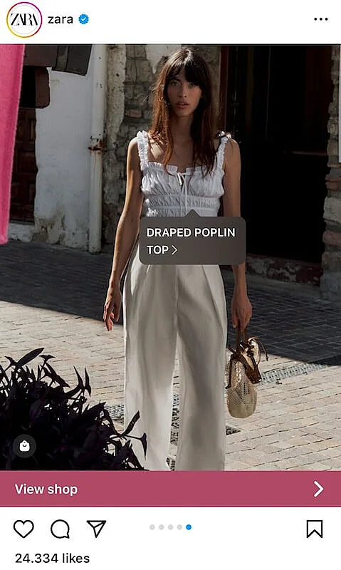 Zara Instagram post showing a model wearing a white top and off-white pants.