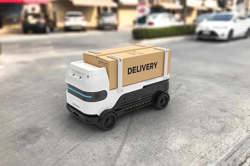 The image shows a toy track where it's written "delivery".