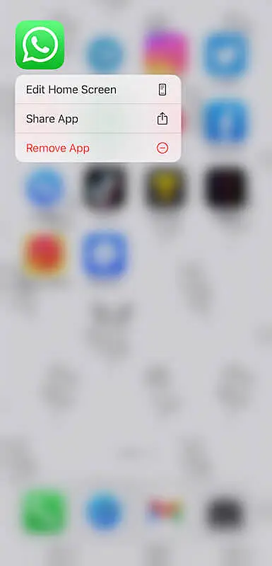 iPhone screen showing WhatsApp icon, and the options to edit home screen, share app, and remove app.