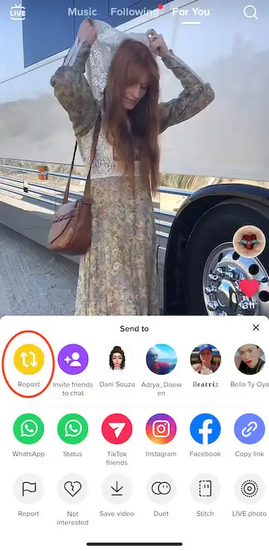 How to repost on TikTok - share button Tik Tok for you page showing the repost button