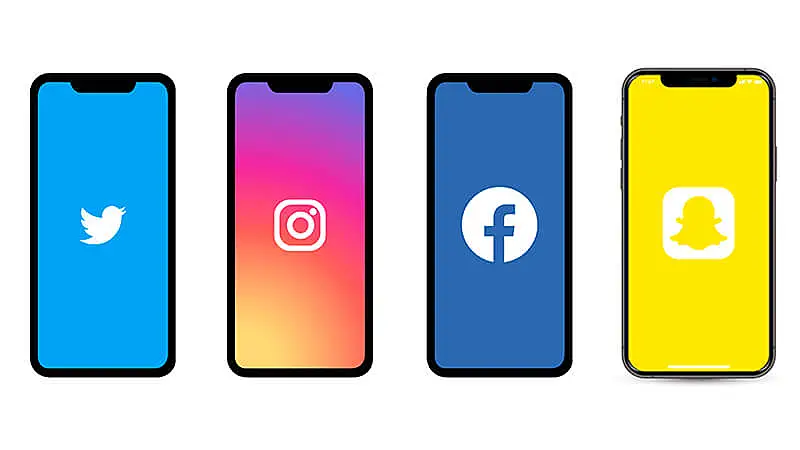 Ilustração de três celulares, um com o ícone do Snapchat, outro com Instagram e o ultimo com ícone do Facebook