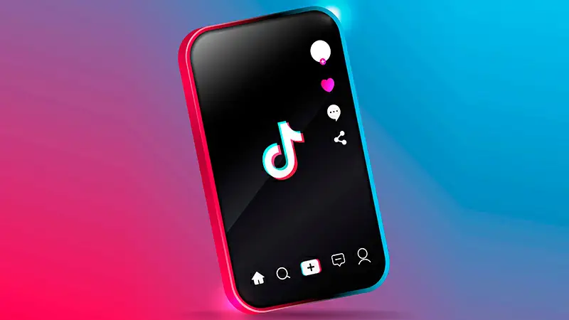 Melhor horário para postar Tik Tok Foto de um celular com a logo do TikTok