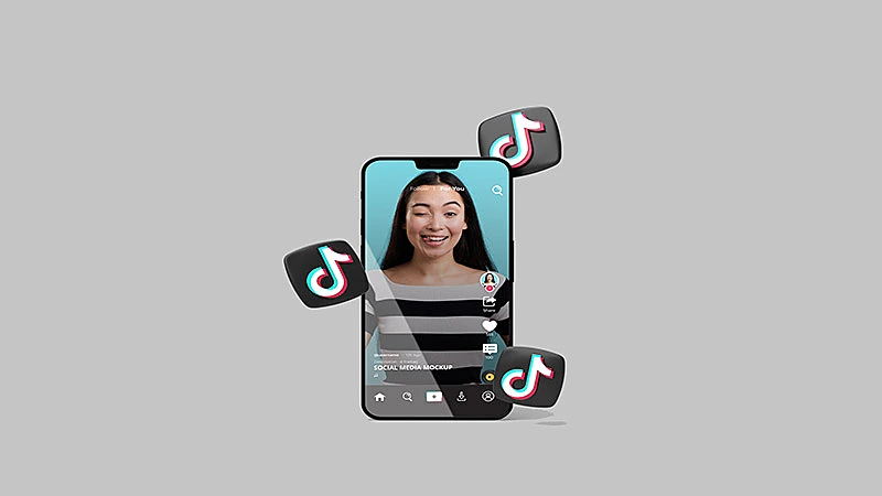 imagem de um celular com o tiktok aberto e vários ícones do tiktok em volta