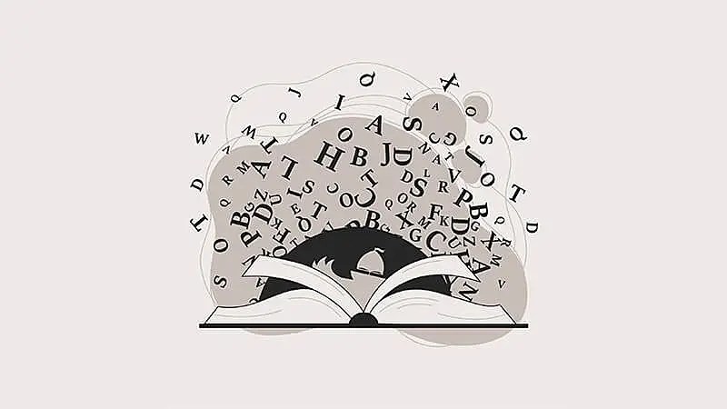 livro aberto com várias letras saindo de dentro dele