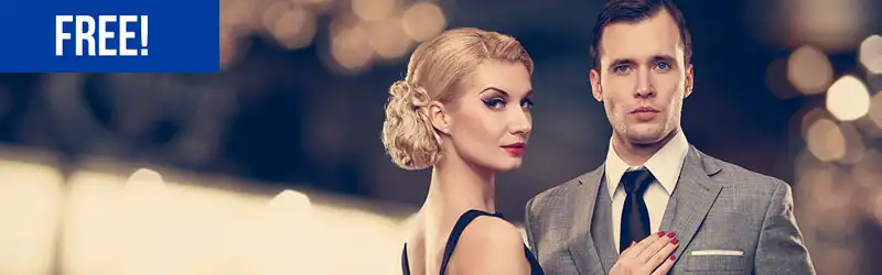 Casal vestido com roupas de gala e um fundo borrado com o efeito bokeh