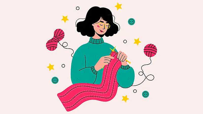 Duas pessoas criando artesanatos com barro