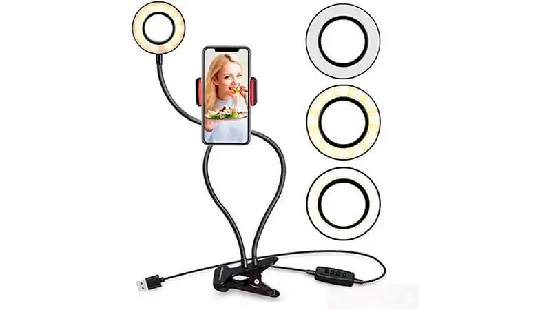 Ring Light Articulada imagem de uma Ring Light de 8.5 centímetros de diâmetro articulada com um celular acoplado
