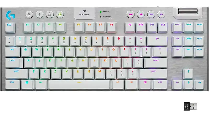 imagem de um teclado mecânico Logitech G915 na cor cinza com iluminação RGB