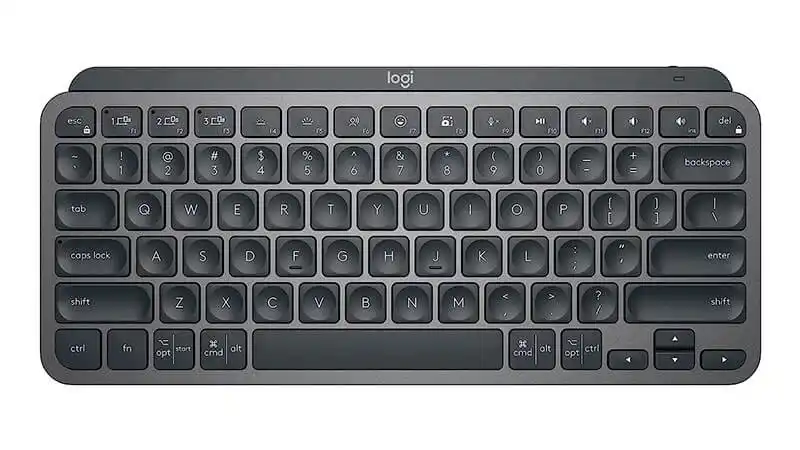imagem de um teclado sem fio Logitech MX Keys na cor cinza com iluminação em LED branco
