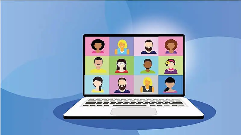 The image shows a laptop screen with a metting conference where there are several people in separated squares.