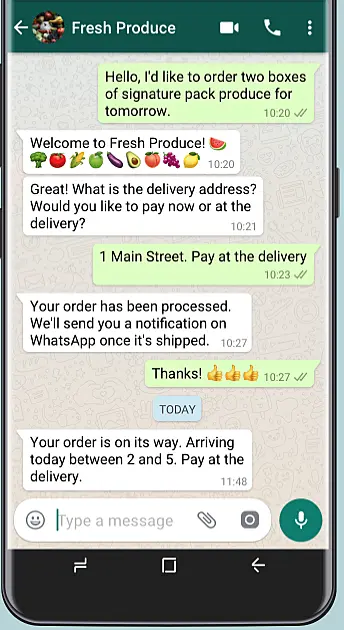 Mobile phone showing a WhatsApp conversation